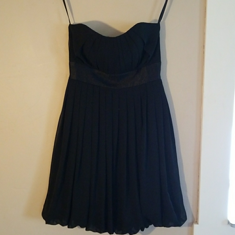 Strapless black dress.